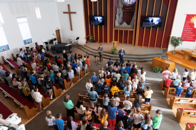 Worshiping together in weekly chapel
